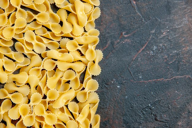 Horizontal view of butterfly pasta on the top of the mixed color table