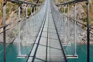 Free photo horizontal view on himalayan footbridge crossing the drac near lake monteynard