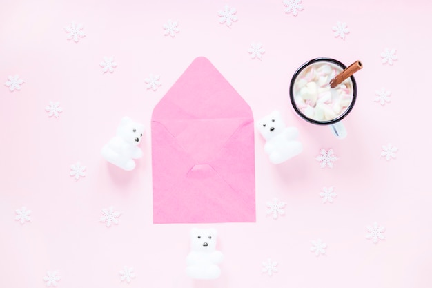 Hot chocolate and snowflakes near envelope and bears