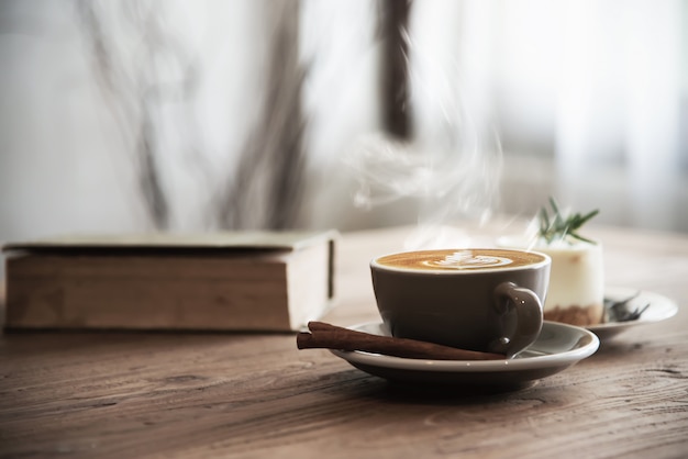 Hot coffee cup set on wooden table