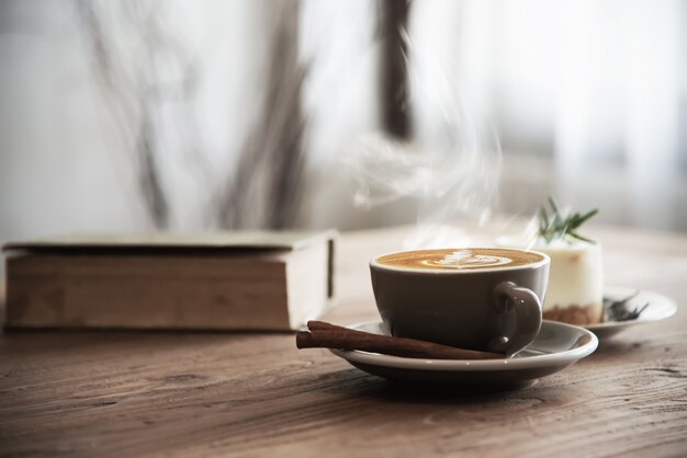 Hot coffee cup set on wooden table 