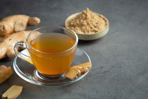 Hot ginger tea on table