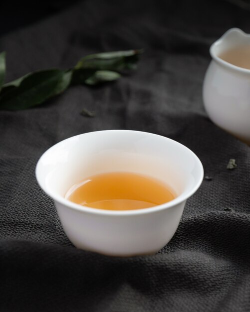 Hot green tea on bowl