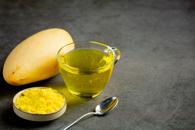 Hot mango tea on table