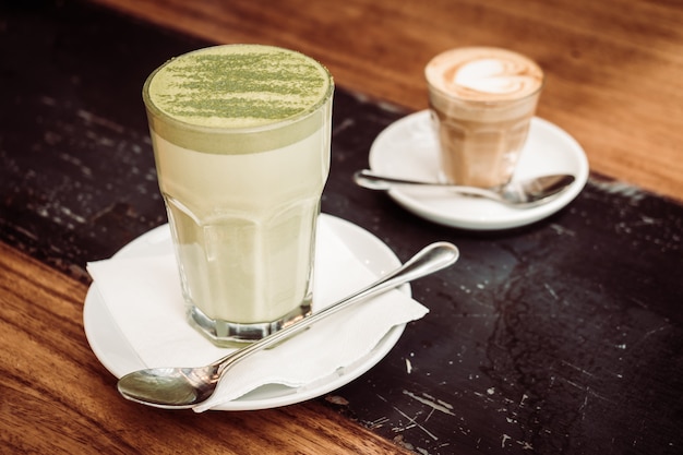 Hot matcha green tea latte cup