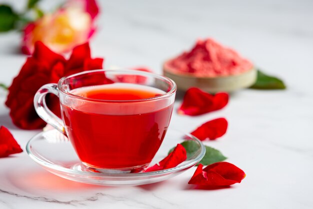 Hot rose tea on table