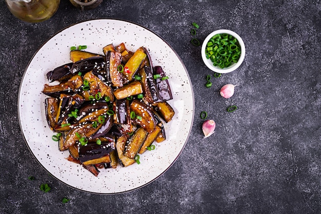 Hot spicy stew eggplant in Korean style with green onion