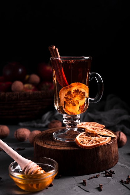 Free photo hot tea with cinnamon and honey