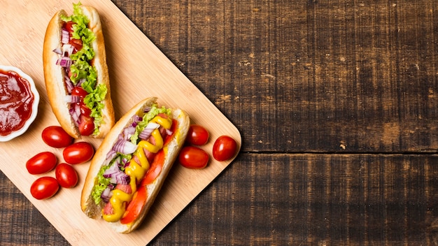 Hotdogs on cutboard with copy space