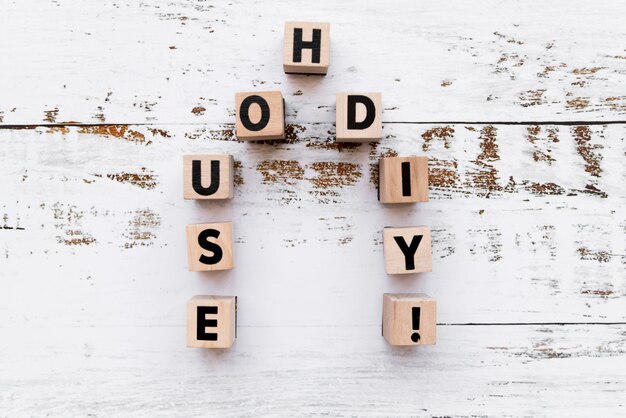 House diy wooden blocks on weathered wooden white table