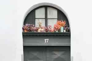 Free photo house entrance door with decorated porch