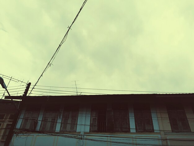 House with cloudy sky