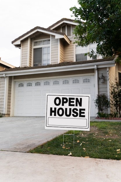 Free photo house with yard sign for open house