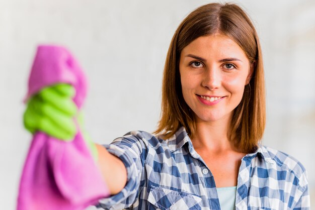 Free photo housekeeper holding a rag