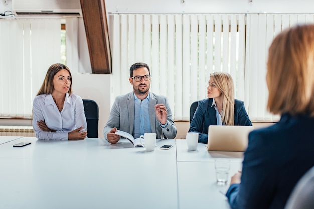 Hr department interview a young female applicant.