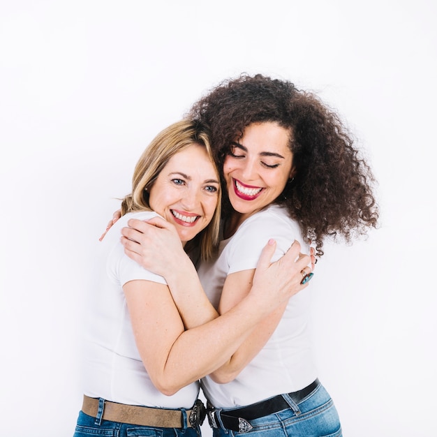 Hugging mother and daughter