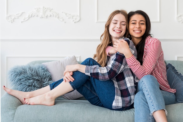 Free photo hugs of happy girlfriends