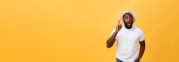 Free photo human face expressions emotions and feelings handsome young african american man looking up with tho