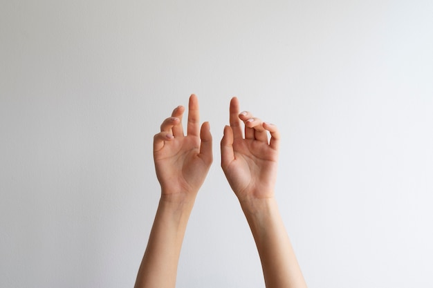 Human hands against clear background