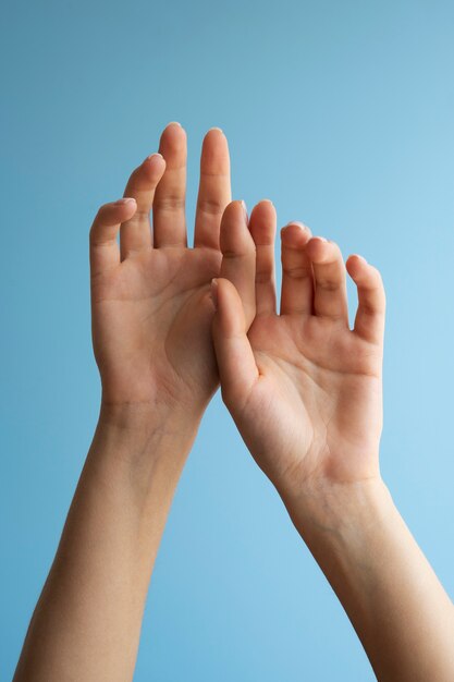 Human hands against clear background