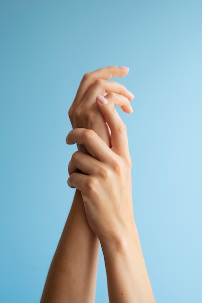 Human hands against clear background