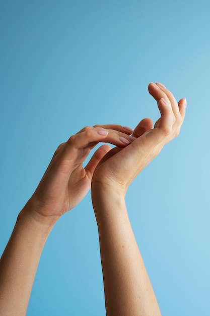 Human hands against clear background