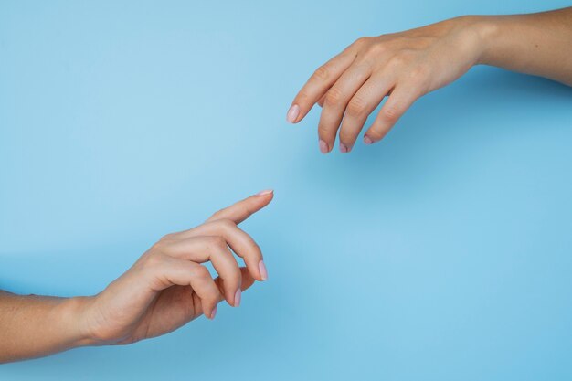 Human hands against clear background