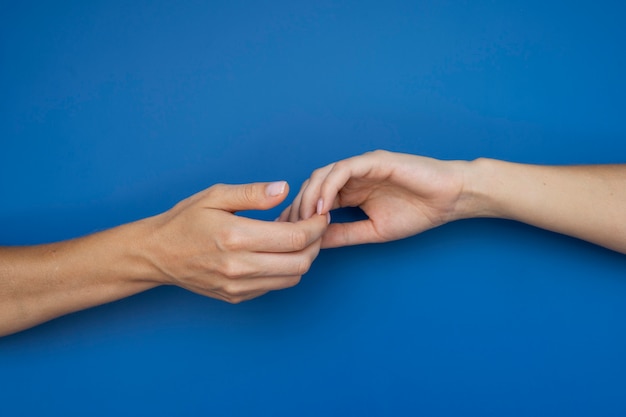 Human hands against clear background