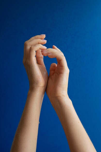 Human hands against clear background