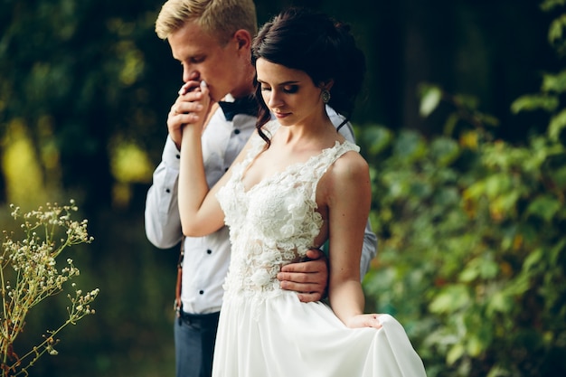 Husband kissing his wife's hand