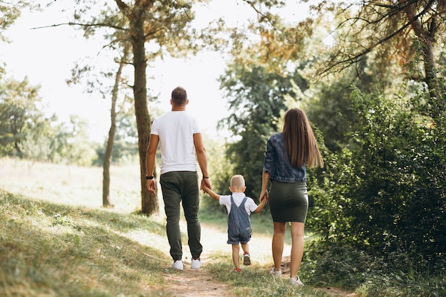 Husband with pregnant wife and their son