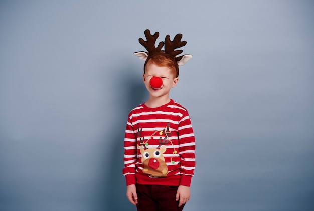 I am so cute boy in reindeer costume