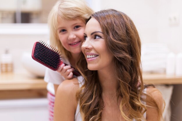 I love combing hair of my mommy 
