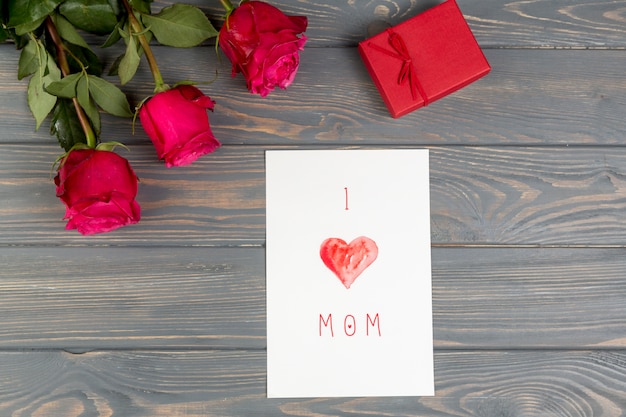 I love mom inscription with rose and gift