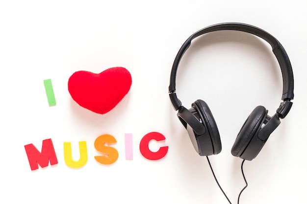 I love music text and headphone isolated over white background