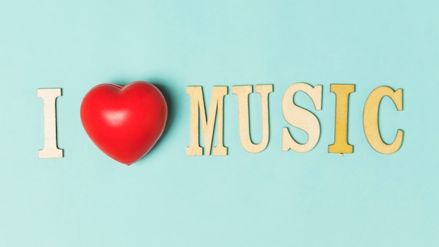 I love music text with red heart on turquoise background