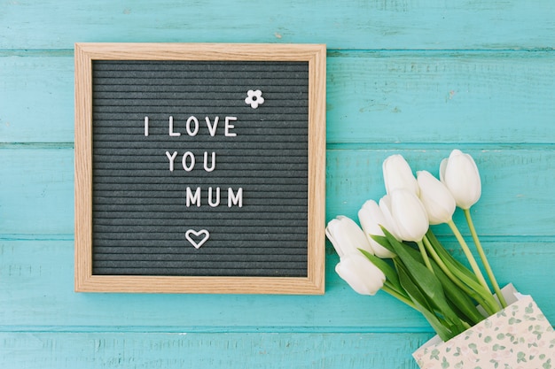 I love you mum inscription with tulips