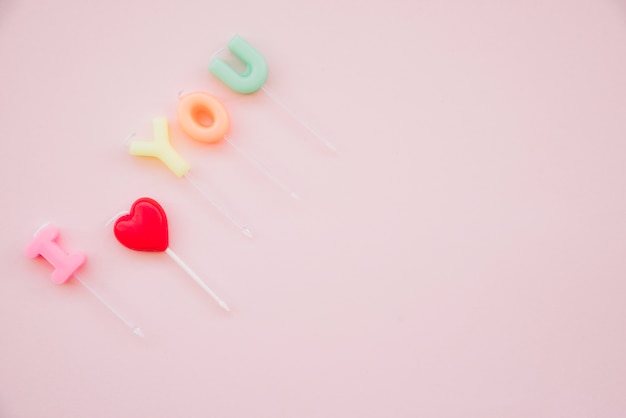 Free photo i love you title of lollipops on wands