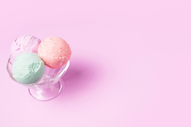 Ice cream balls on glass bowl
