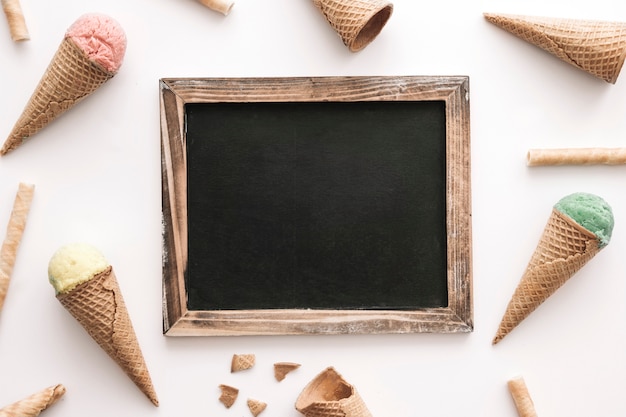 Ice cream concept with slate and cones