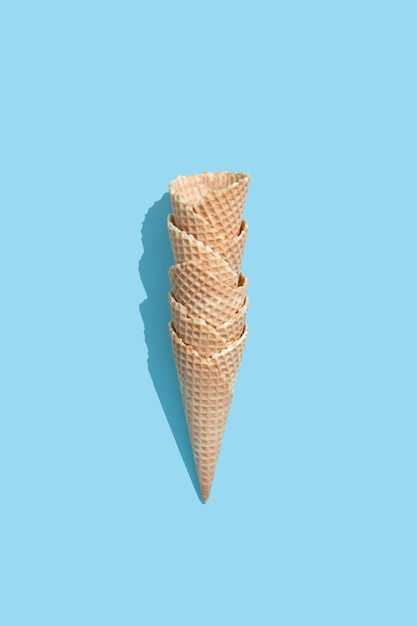 Ice cream cone on color background