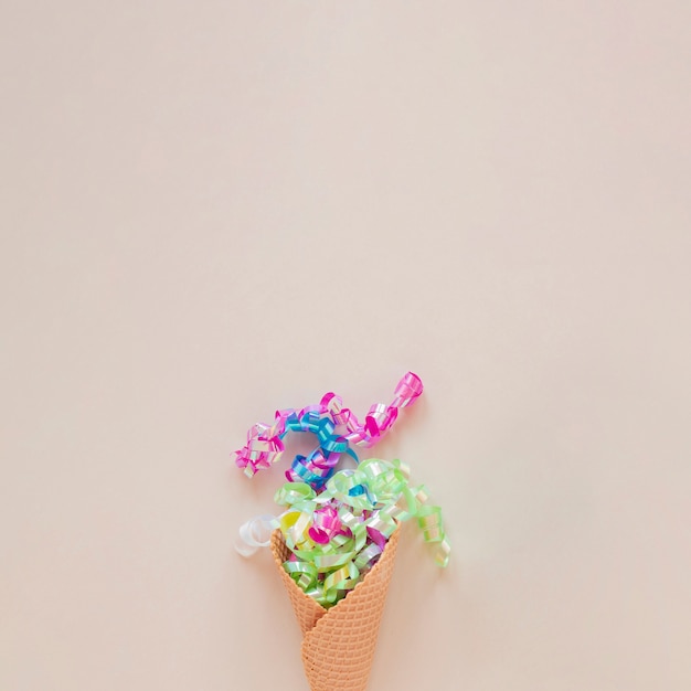 Free photo ice cream cone with confetti and copy space