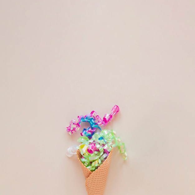 Ice cream cone with confetti and copy space