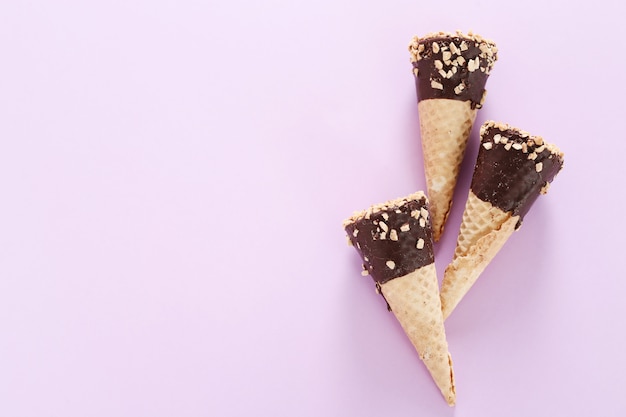 Ice cream cones with almonds and chocolate