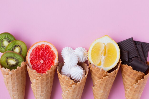 Ice cream flavors on pink table