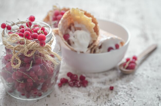 Ice cream in a waffle cones and berries