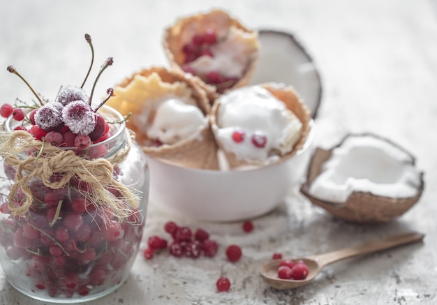 Ice cream in a waffle cones and berries