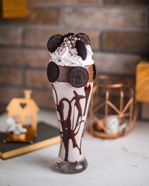 Ice cream with cookie on the table