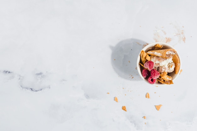 Ice cream with raspberry and wafer