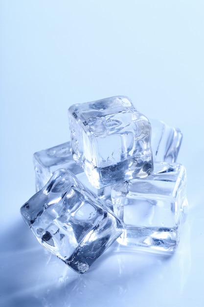 Ice cubes isolated on blue
